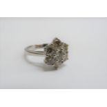 A white gold diamond daisy ring 2.17ct total, stamped 14k. Size O, 5.1g
