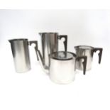 A selection of Stelton Cylinda line stainless steel by Arne Jacobsen. Tallest piece 20cm