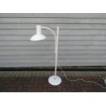 A Danish standard lamp in white with adjustable single light and metal shade