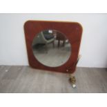 A Danish Teak and Beech veneered wall mirror back with circular mirror and integral single light
