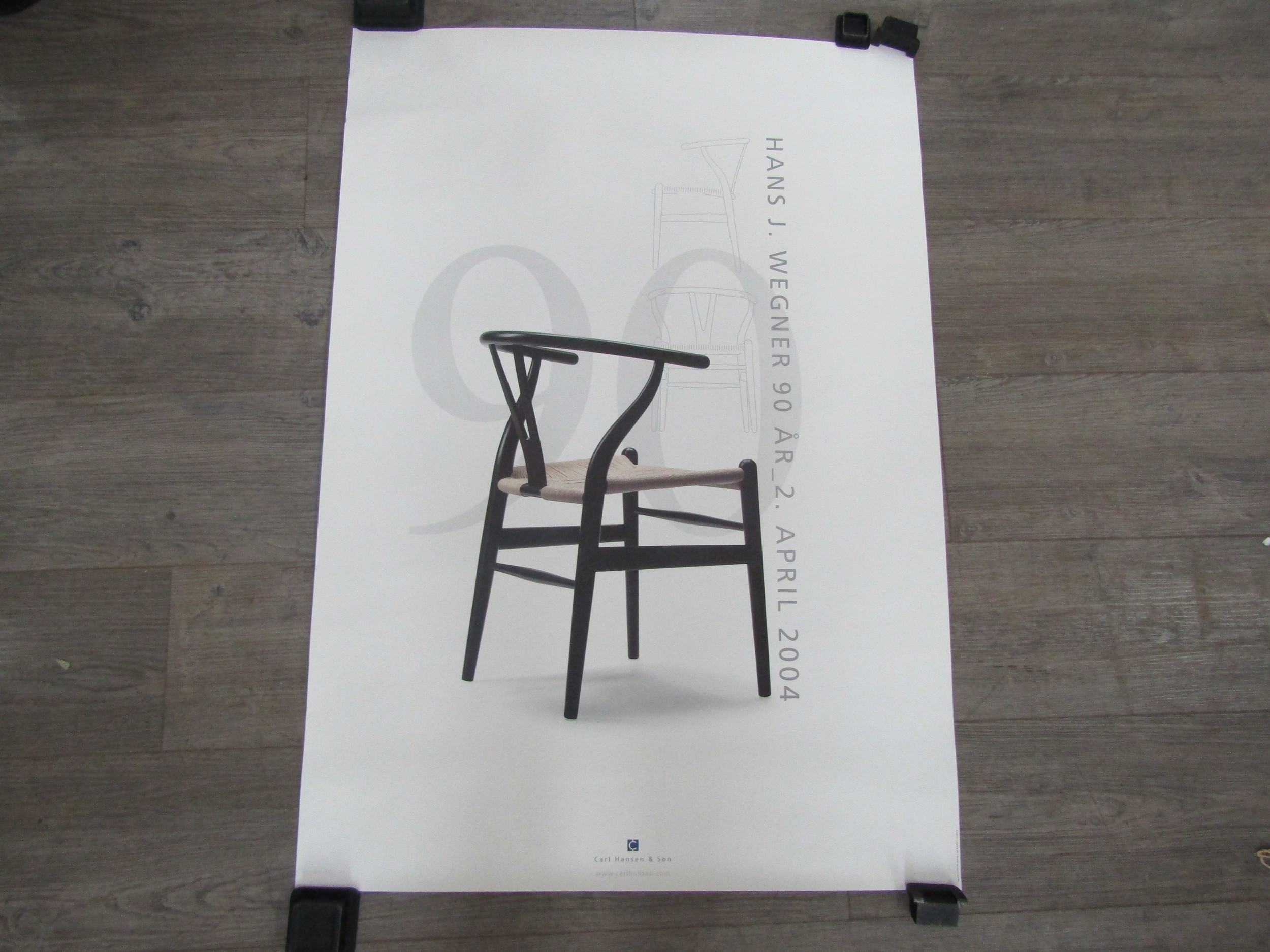 A Hans Wegner furniture poster for Carl Hansen and Son, April 2004. 100cm x 70cm
