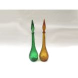 A pair of Italian glass "Genie bottles" in green and amber, 55cm high