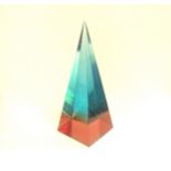 A Jonathan Adler Lucite pyramid sculpture in turquoise and pink. Largest size available 40cm high.