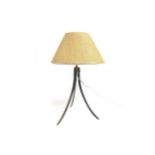 A Brass tripod table lamp with woven cane shade, 65cm high including shade