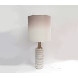 A Bitossi lamp base in white with impressed motifs (possibly made for Pier UK) with shade. Base 54cm