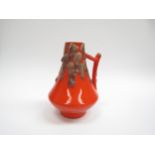 A West German Fat Lava vase with single handle, orange glaze with brown molten lava drips, No 44/20.