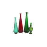 Four Italian glass bottles in green and red, various styles, one with stopper. Tallest 51cm