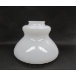 A 1960's Murano hand-blown glass light shade in white with a clear relief moulded base. 27cm high