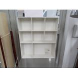 A Finnish Palaset wall mounting open shelf cabinet in white hard resin. 58cm x 50cm x 11cm