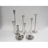 A collection of stainless steel candle holders including Danish, Old Hall etc. Tallest 32cm (6)