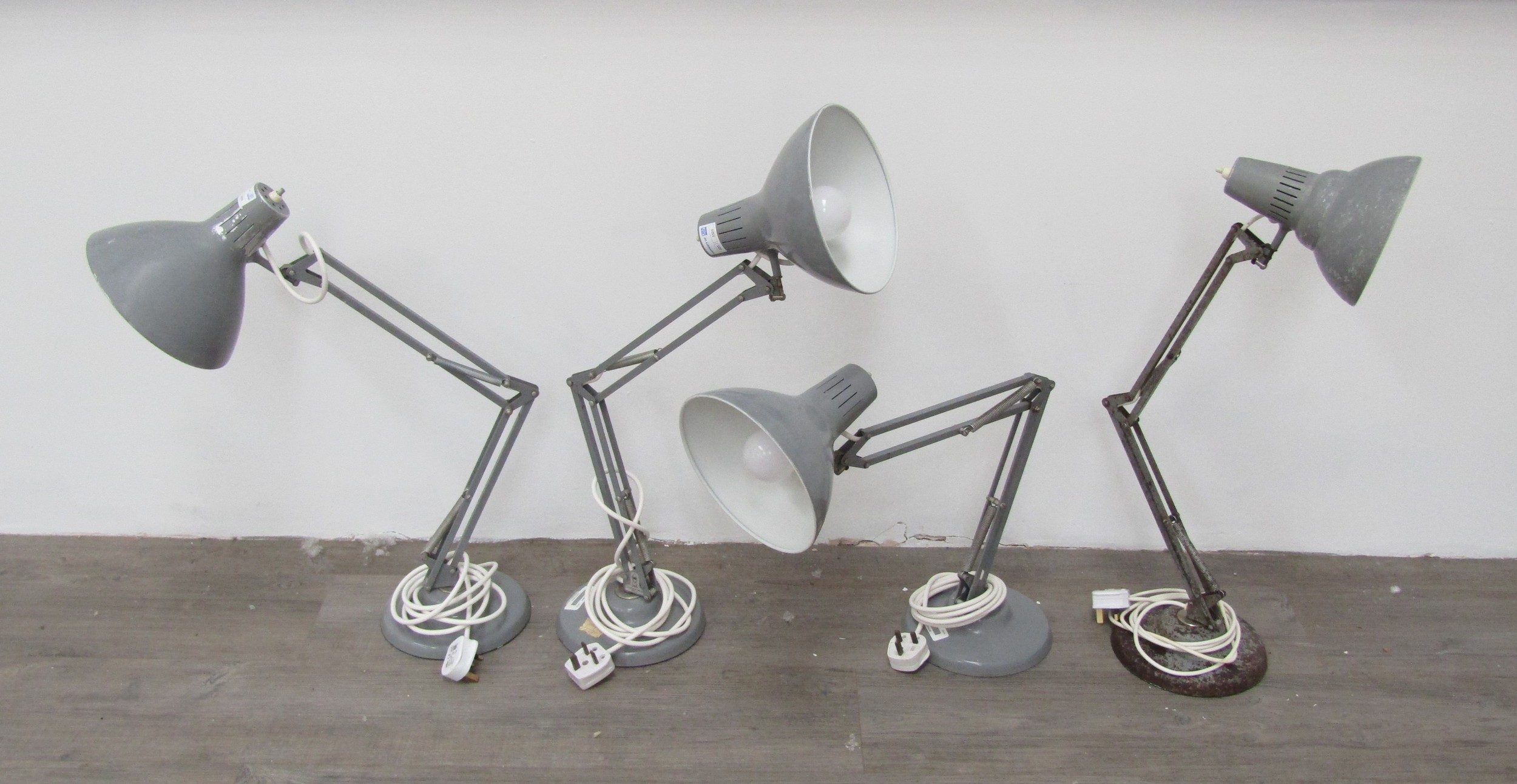 Four '1001' model angle poise lamps in grey colourway