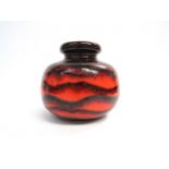 A Scheurich West German Pottery Fat Lava Vase in orange red and brown glazes. No 284-15 to base.