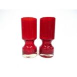 Two Alsterfors red glass vases designed by Per Olaf Strom. 17cm and 16.5cm high