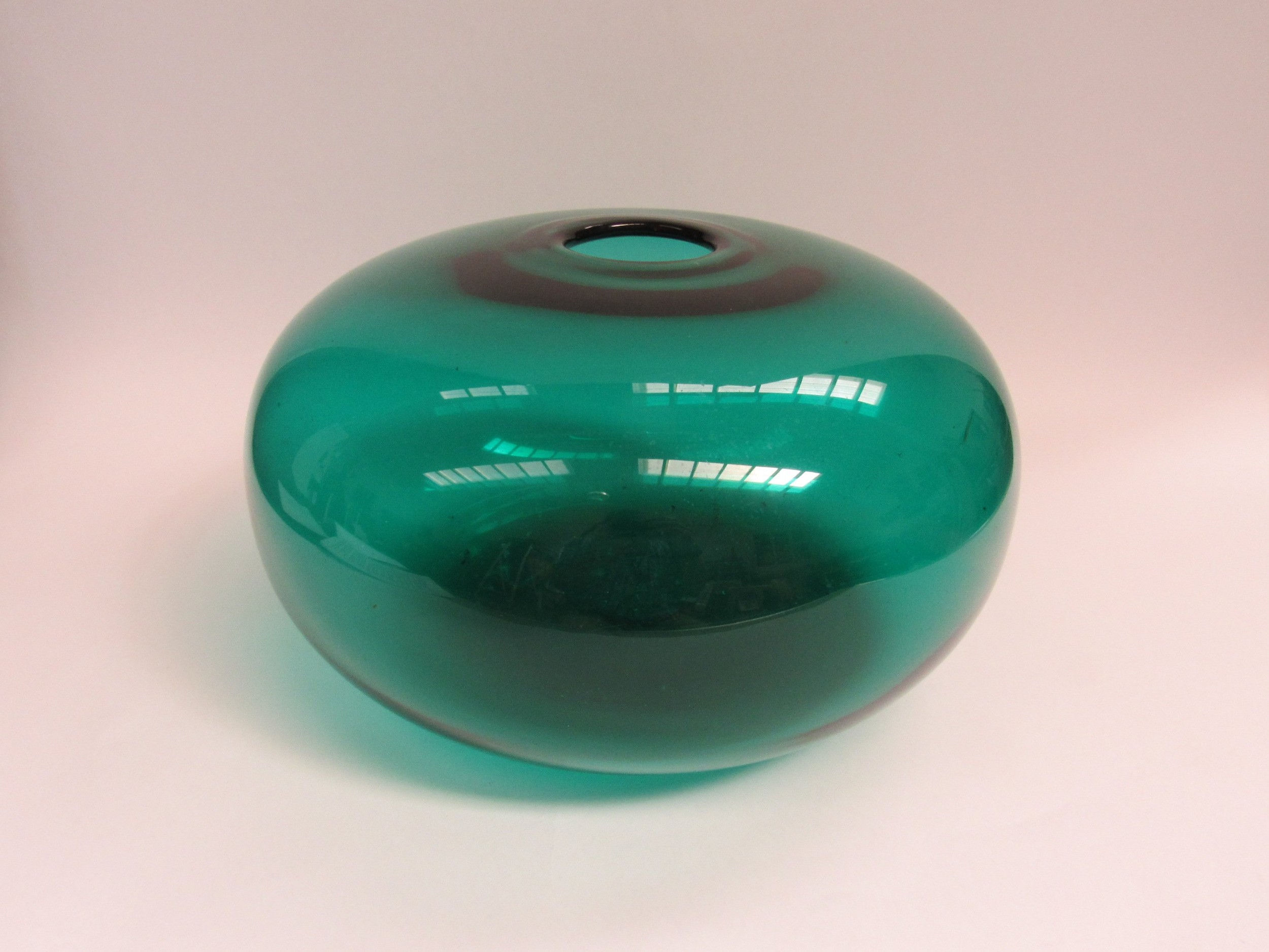 An Ola Wilborg large green hand blown glass vase in the scarce 'Stockholm' range for Ikea. 19cm high