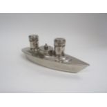 A Chromed metal condiment set in the form of a ship. 8cm high x 20cm long