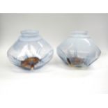 A pair of 1960's Murano light shades in blue with relief moulded base in amber. 17.5 high x 22cm