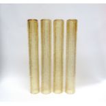A set of four 1960's Murano glass light shades of cylindrical form in textured caramel colour,
