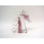 A Nason Murano glass horse head in pale pink, cased in clear glass, 1970's. 18cm high
