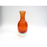 An Italian Glass vase in orange and pale green encased in clear, label to base for V and AM