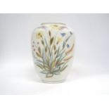 A Rorstrand pottery vase with painted floral spray over a white ground by Lars Thoren. 22cm high