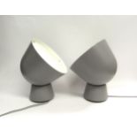 A pair of multi-functional wall/floor/desk lights designed by Ola Wihlborg. 31cm high