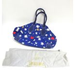 A Vivienne Westwood holdall bag with hearts and stars design. Approx 46cm x 28cm high not