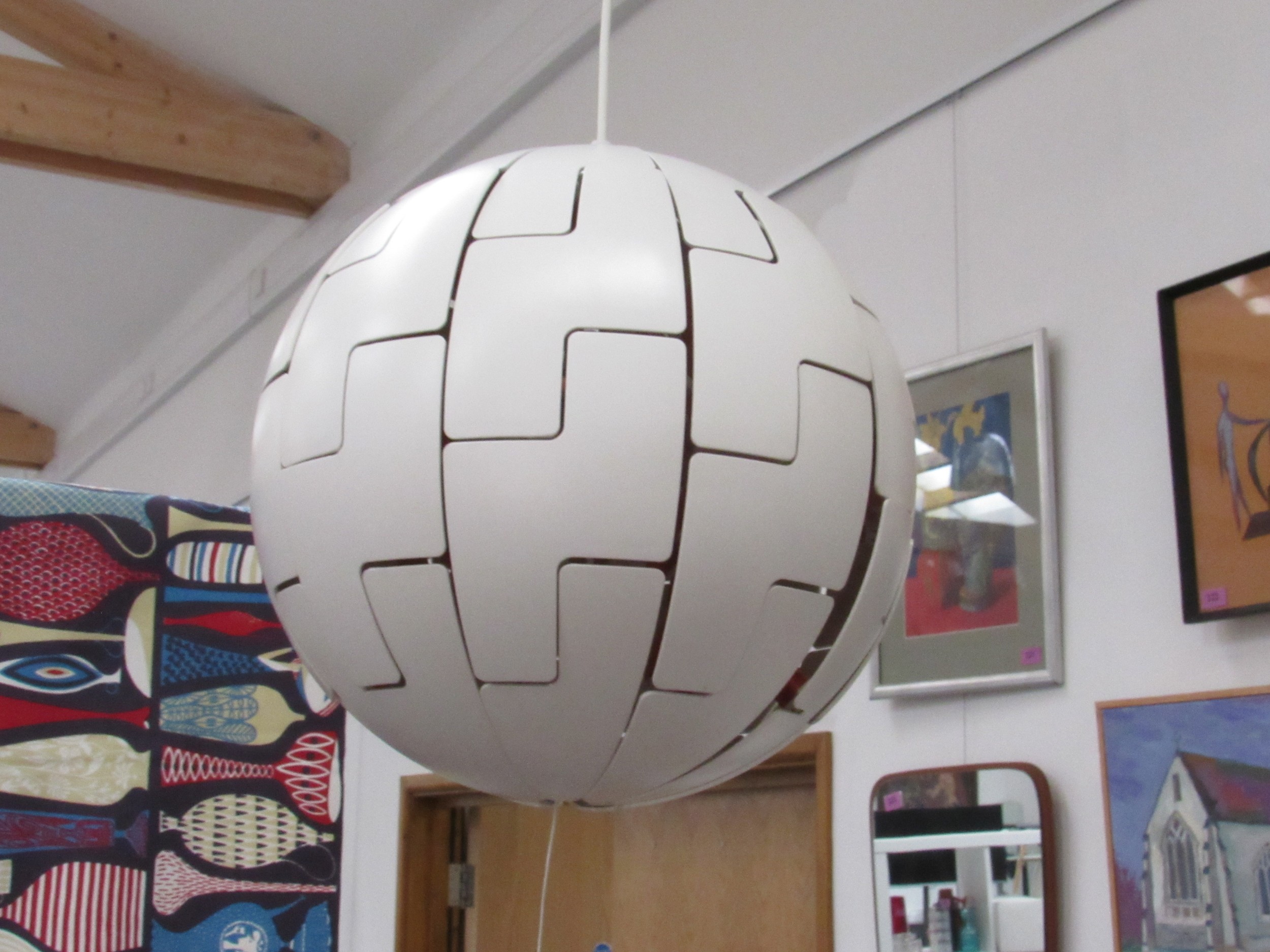An Ikea 'Death Star' lampshade by David Wahl, approx 38cm high
