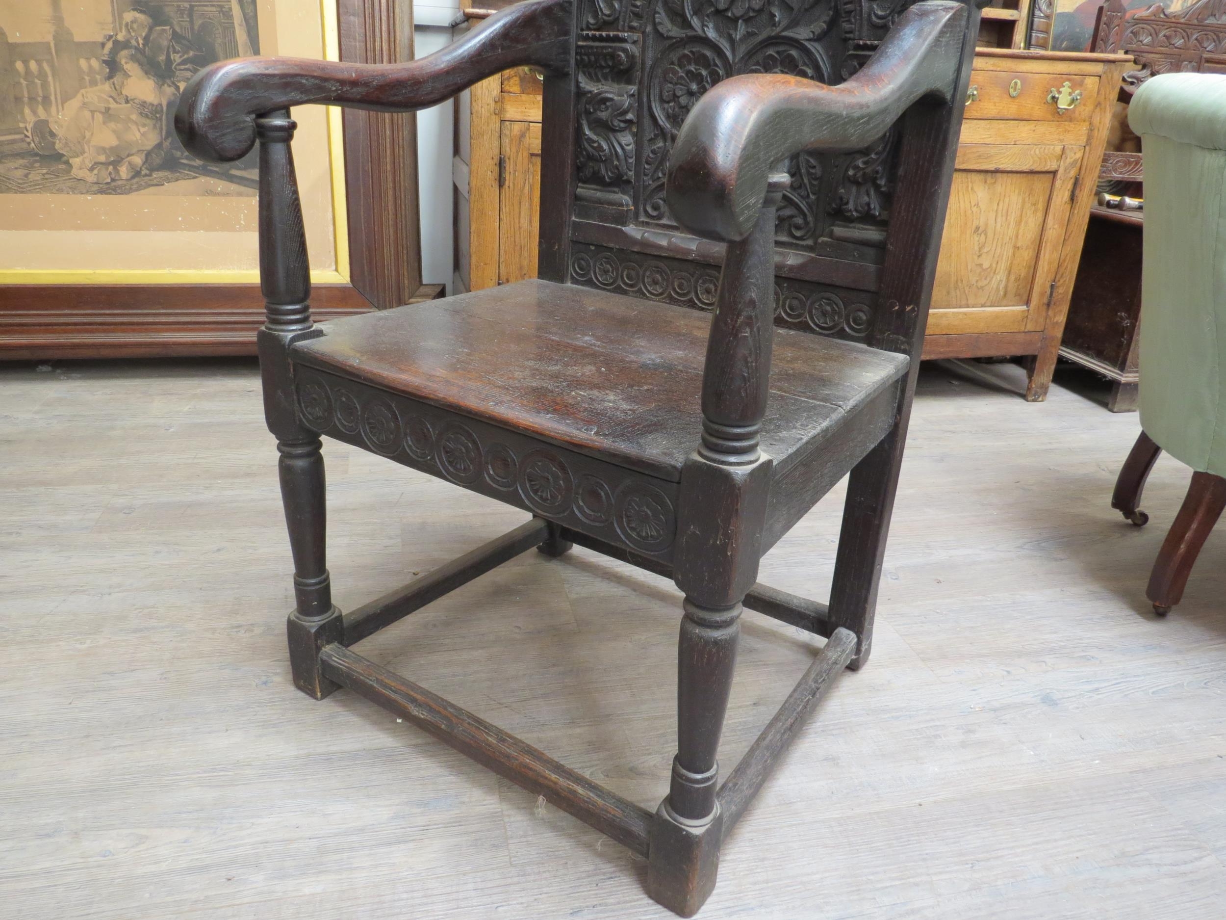 A 17th Century and later Wainscot chair with scroll top and dragon detail, vine, leaf and flower - Image 4 of 5