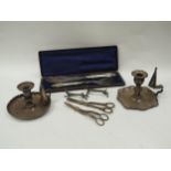 Two 19th Century silverplate chamber candlesticks, grape scissors, knife rests and cased fish