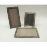 Three silver plain photograph frames of varying sizes, makers and dates, 16.5cm tall, 22cm tall