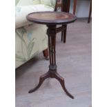 A late 19th / early 20th Century wine table with four pillar support tripod base, top diameter 27.