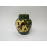 A Moorcroft Hibiscus pattern lidded ginger jar, 15cm tall