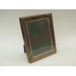 A Carrs of Sheffield silver photograph frame dated 1991, 22cm tall