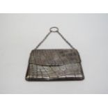 A Sampson Mordan & Co. silver snake skin effect purse, London 1907, makers mark rubbed, 7cm x 10.5cm