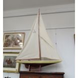 A large model pond yacht on stand, approximately 180cm high x 125cm long including stand