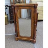 A Victorian burr walnut music pier cabinet with three quarter gallery back and decorative pillars,