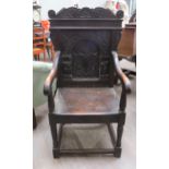 A 17th Century and later Wainscot chair with scroll top and dragon detail, vine, leaf and flower
