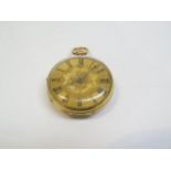 An 18ct gold engraved pocket watch with key, 33.1g total
