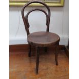 A child's Thonet style bentwood chair with decorative seat, 65cm tall