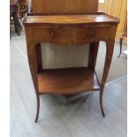 A 19th Century French walnut side table, the galleried top over serpentine front with slide over