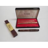 A Parker 12ct 1/10th rolled gold fountain and ball point pen set and Parker Victory fountain pen (3)