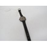 A WWI silver cased officers wristwatch, black face, import marks for London 1917, Swiss made