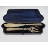 A Victorian Martin, Hall & Co. fish serving knife and fork in case, Sheffield 1863, 216g