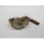A TREBEX B.W.C. London made 9ct gold cased watch with loose B.W.C. watch buckle, crown loose