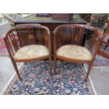 Two similar in style Edwardian mahogany tub chairs with velour upholstered seat, 76cm tall x 52cm
