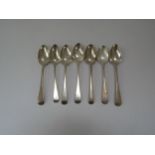 Seven various silver teaspoons including William IV and later terminals monogramed and crested, 120g