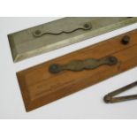 A wooden Norie & Wilson Ltd., London, Captain Fields improved parallel ruler, unnamed metal parallel