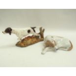 A Royal Copenhagen figure of a recumbent hound plus a Royal Doulton bone china figure of a Pointer