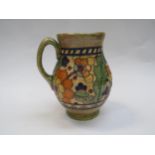 A Charlotte Rhead jug with floral and leaf decoration to body base marked 146, 21.5cm tall