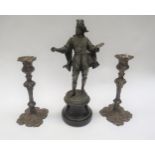 A Spelter figure of 19th Century artist and pair of roccoco candlesticks, 36cm x 23.5cm